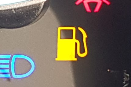 Warning light that looks like a fuel pump.